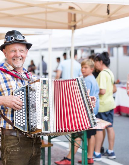 An accordion player at the feast at the pavillon
