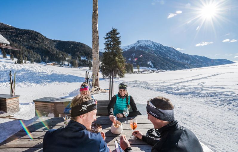 Cross-country skiers having a meal