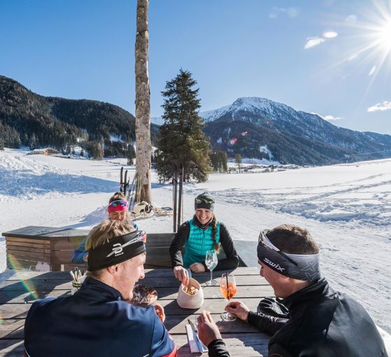 Cross-country skiers having a meal