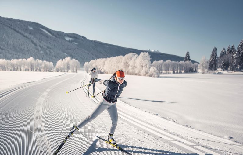 Two cross-country skiers